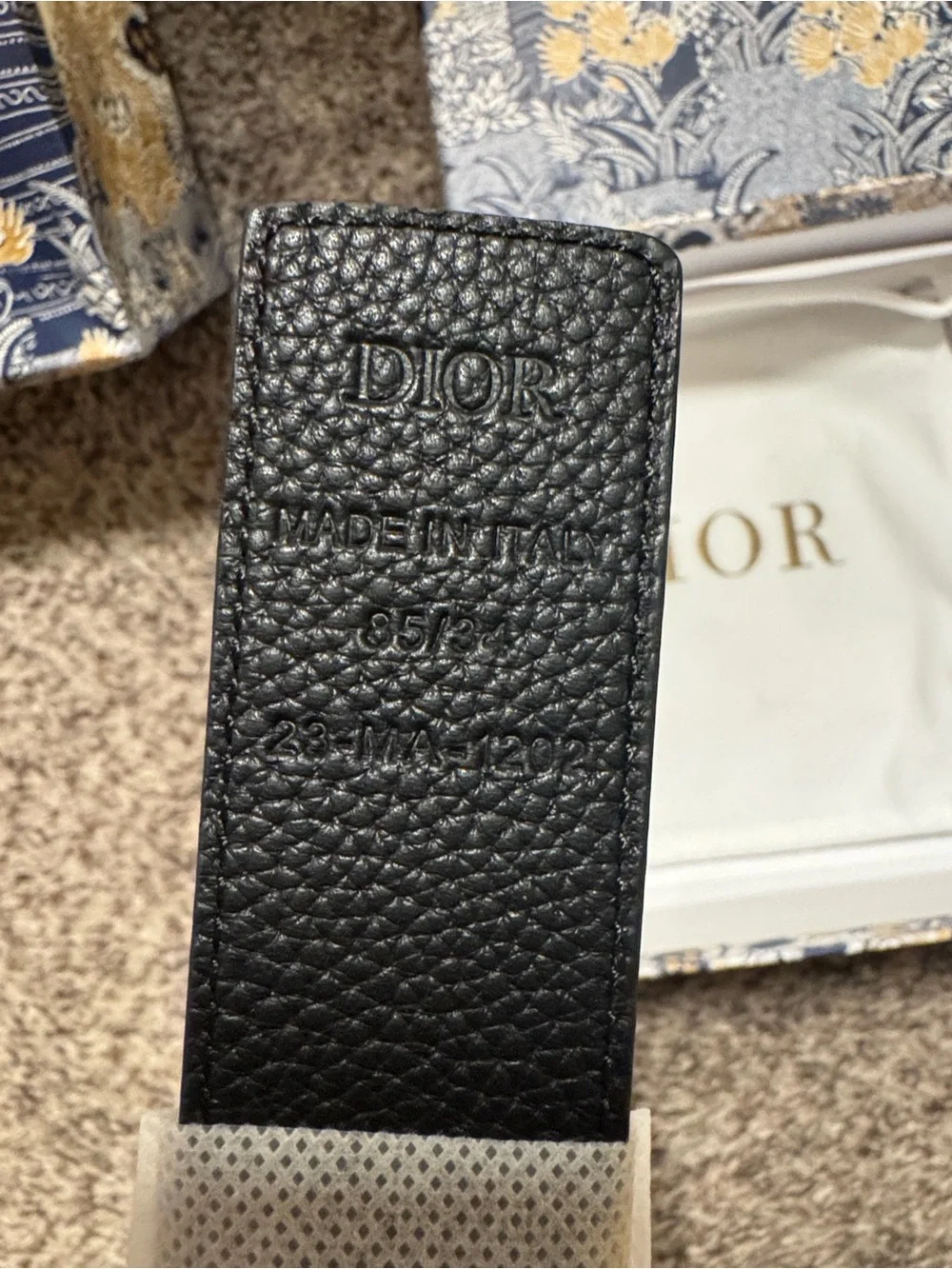 Black monogrammed Leather Belt with Embossed Logo and matte black buckle
